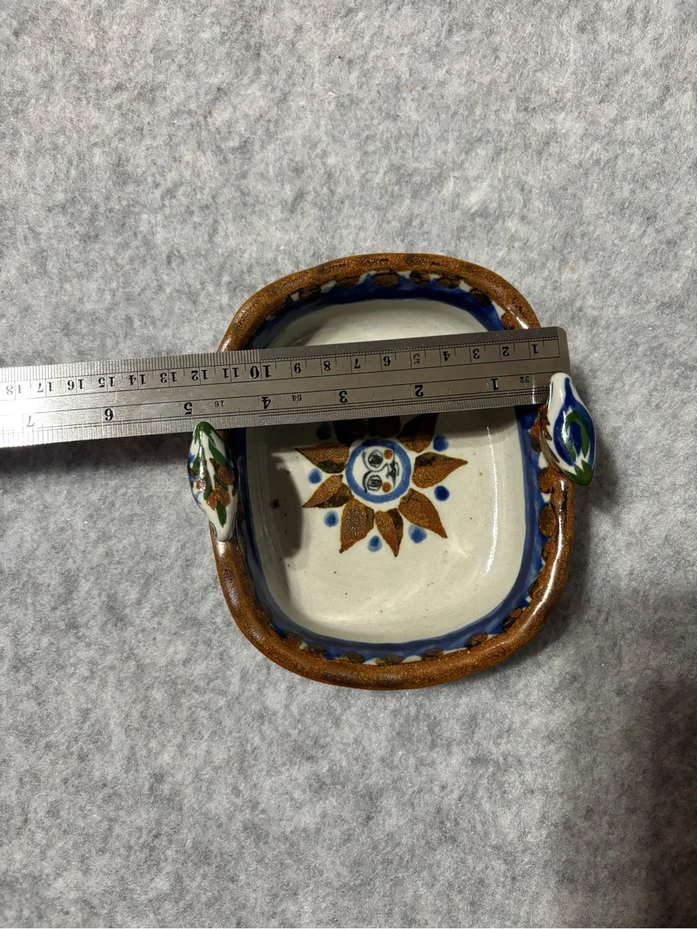 Mexican pottery dish oval ceramic with sun, floral & bird design